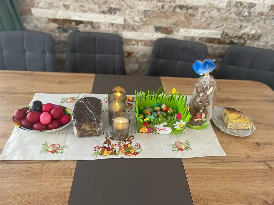 Dyed red eggs, traditional sweet bread and a chocolate bunny — Easter tradition